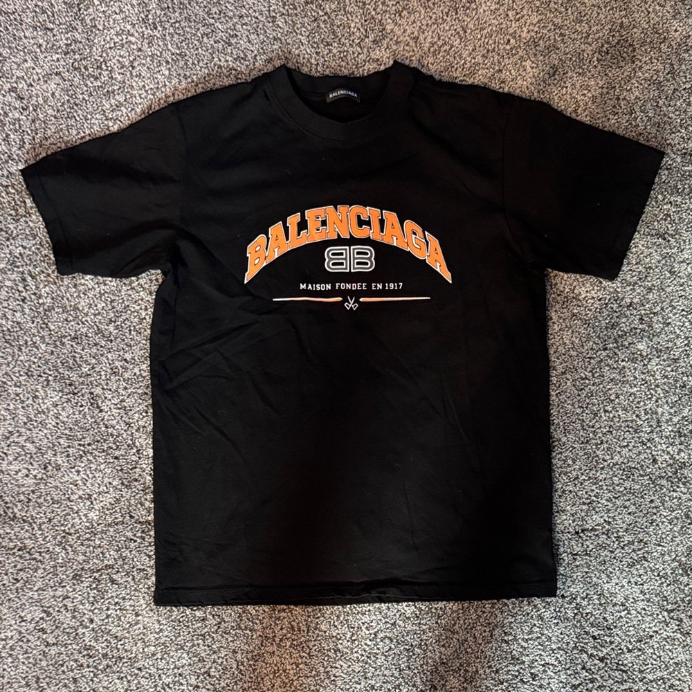 Balenciaga men’s Black Tee with classic Orange Arch Logo